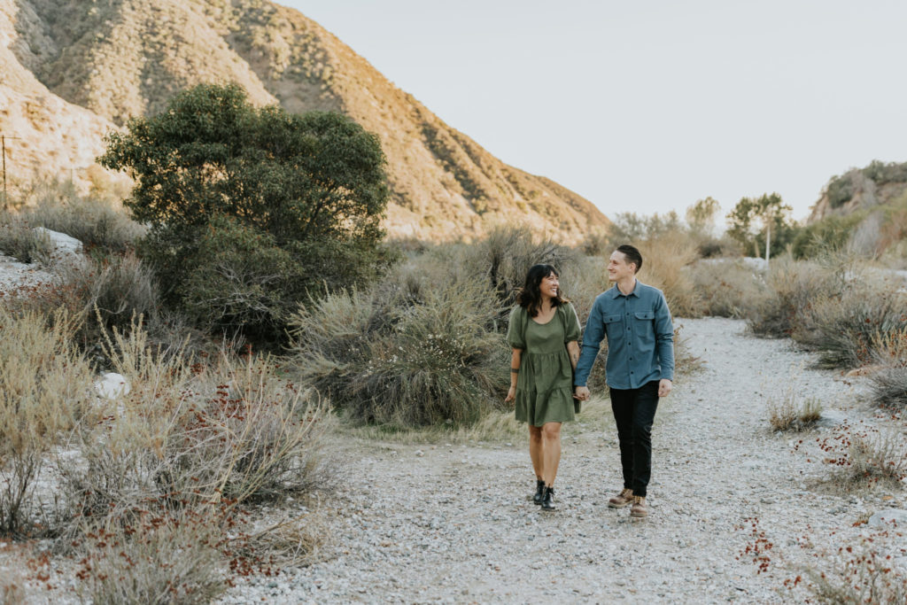 Mt Baldy engagement photoshoot. A couple walking hand in hand in the hills of Mt Baldy California