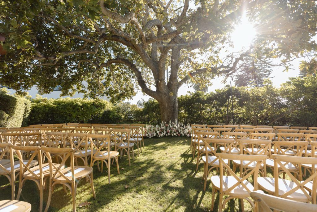 Garden Party Wedding at The Womens Club in La Jolla. Pink and white florals with a ceremony under a tree, garden wedding vibes.